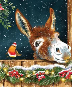 Christmas donkey and robin in snowy stable with festive decorations